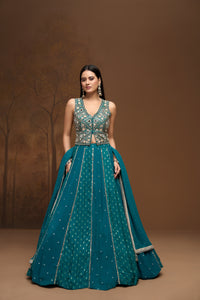 Green mirror embroidered georgette lehenga set with embellished blouse, perfect for Indian wedding wear and festive celebrations.