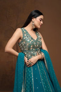 Stylish green mirror work lehenga choli set for weddings, receptions, engagements, and festive party wear.