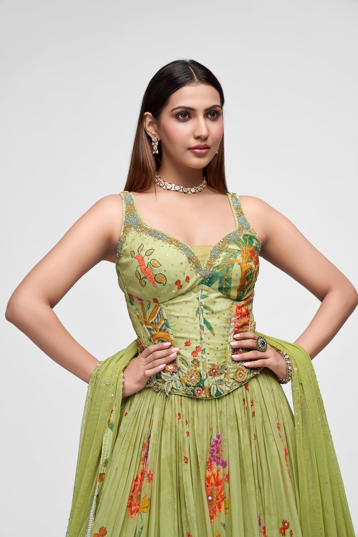 Elegant green floral embroidered corset lehenga set, ideal for bridesmaids, wedding guests, cocktail parties, and festive ethnic wear.