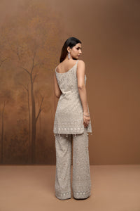 Detailed view of Ace Lucknowi embroidery on georgette sharara set for women, Indian occasion wear