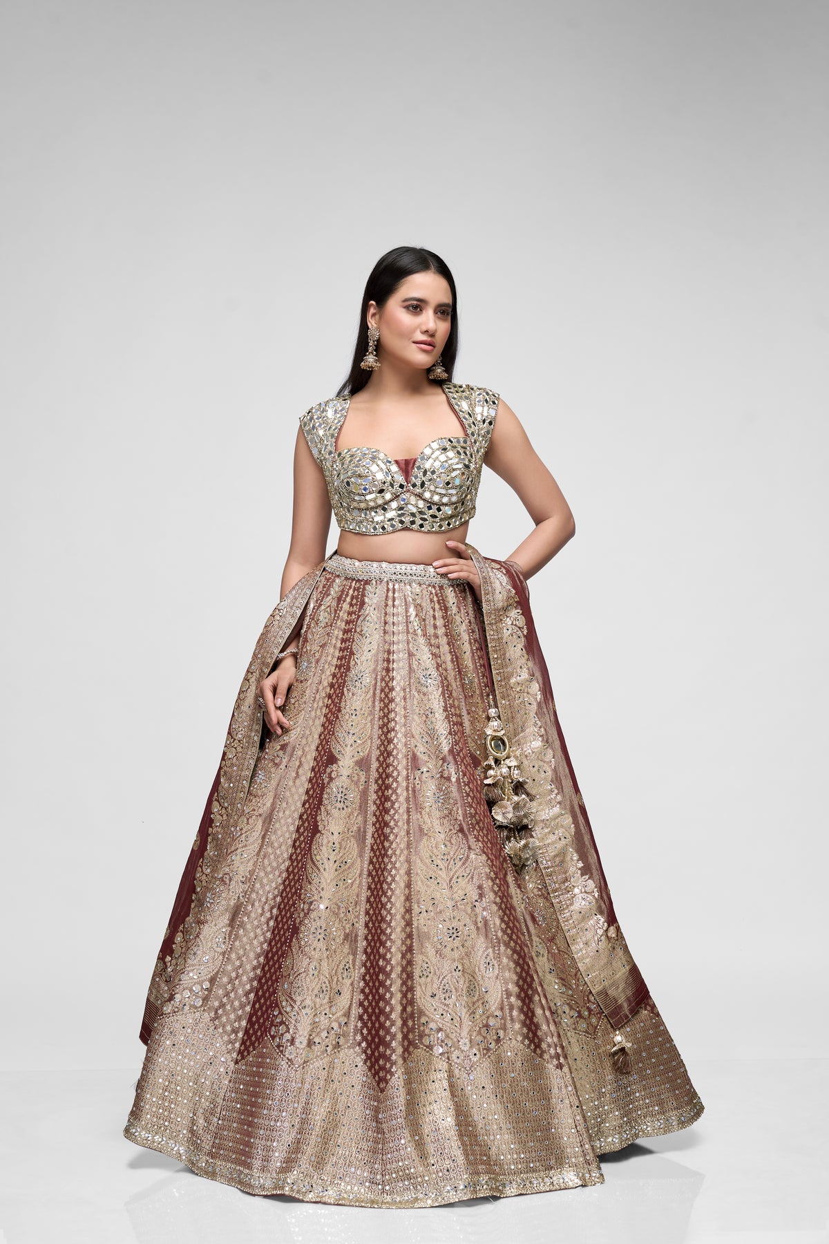 Brown Banarasi wedding lehenga with mirror detailing and tissue silk skirt for bridal and festive occasions