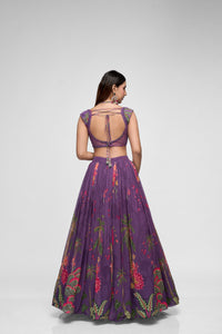 Detailed view of purple printed georgette lehenga with intricate sequin embroidery and cap sleeves, perfect for Indian ethnic wedding and party wear.