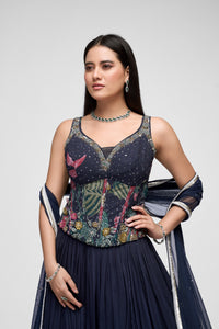 Elegant black floral embroidered corset lehenga set, ideal for bridesmaids, wedding guests, cocktail parties, and festive ethnic wear.