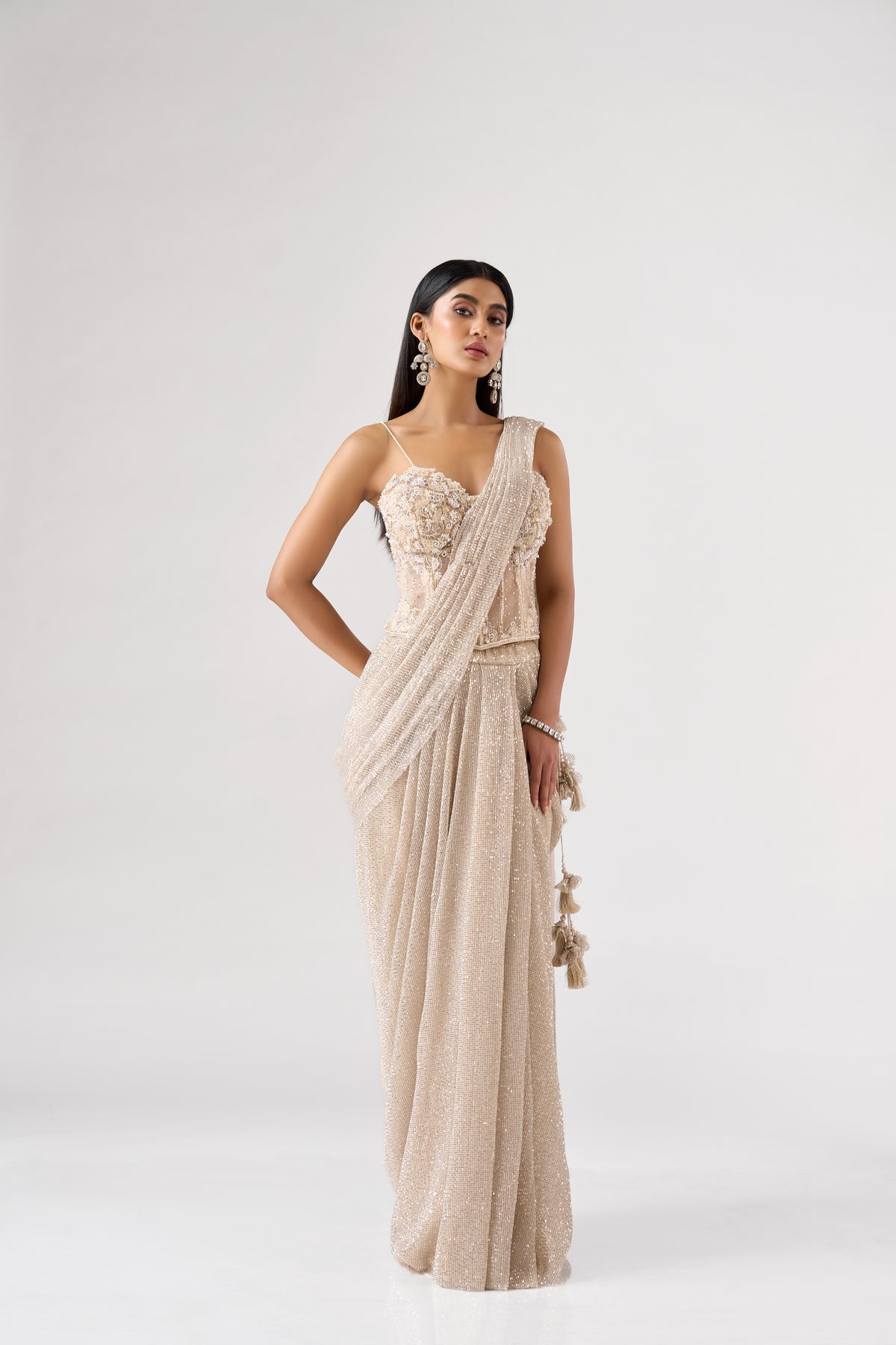 IVORY SEQUINS EMBELLISHED CORSET PRE DRAPED SAREE | Nishly Fashion House