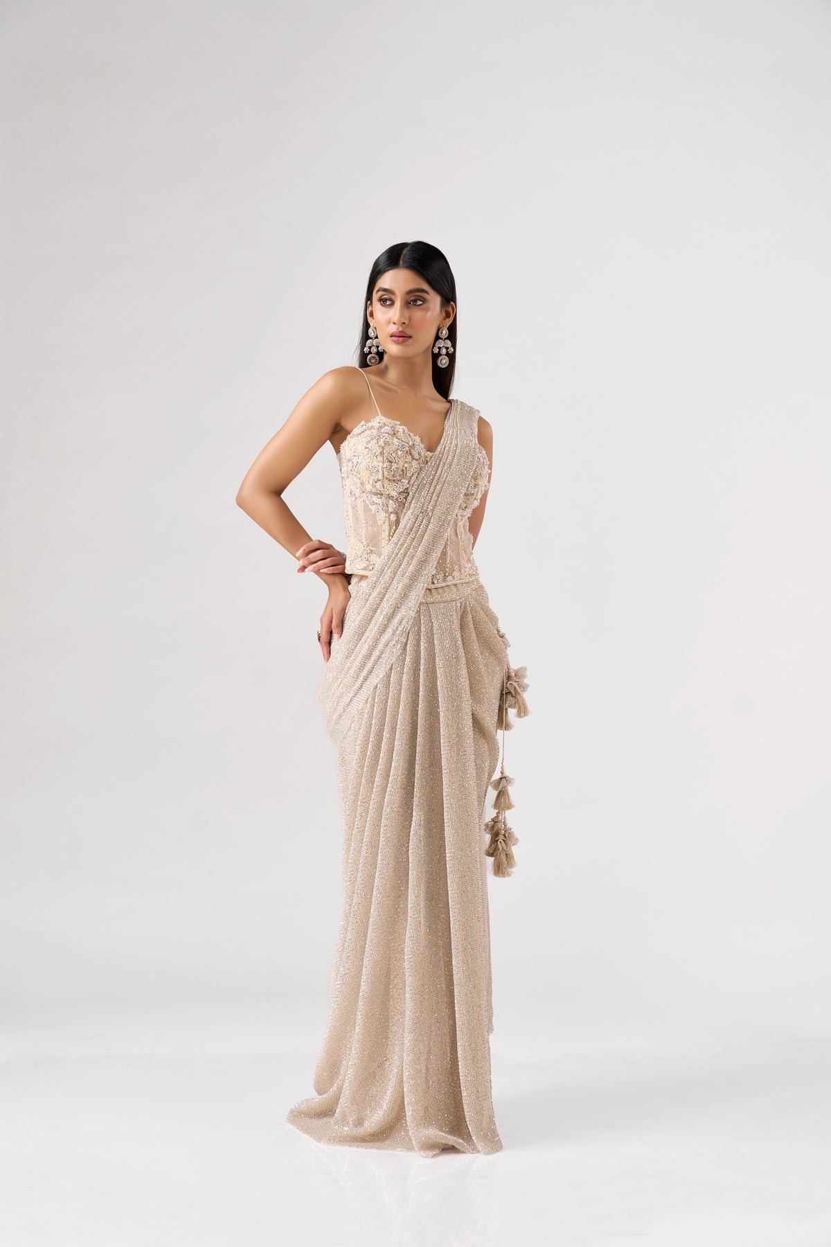 IVORY SEQUINS EMBELLISHED CORSET PRE DRAPED SAREE | Nishly Fashion House