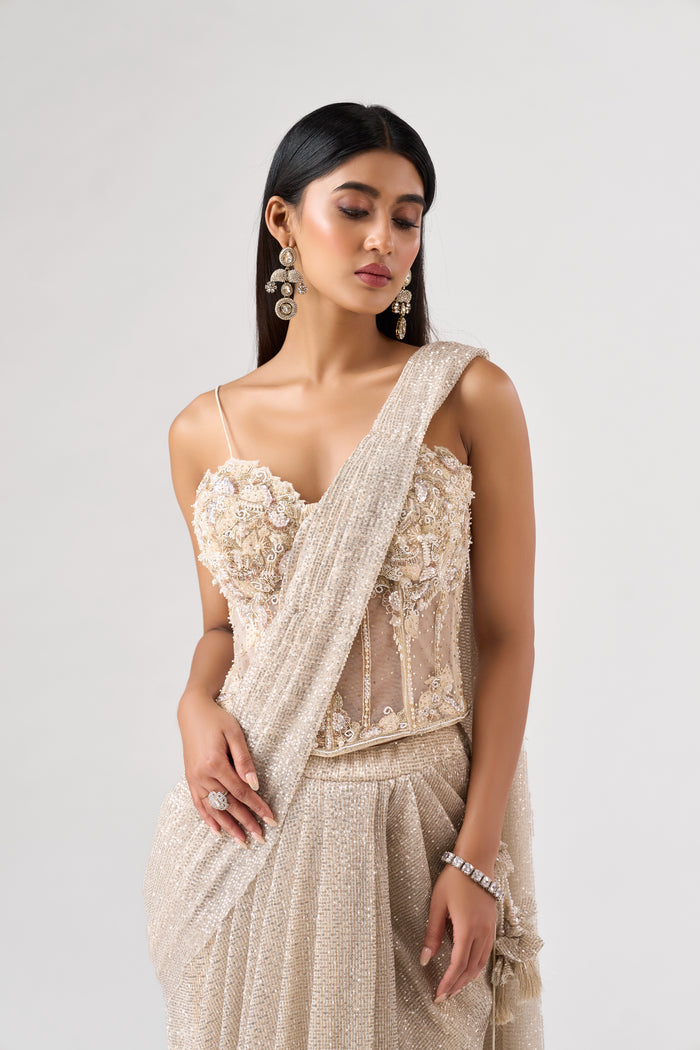 IVORY SEQUINS EMBELLISHED CORSET PRE DRAPED SAREE | Nishly Fashion House