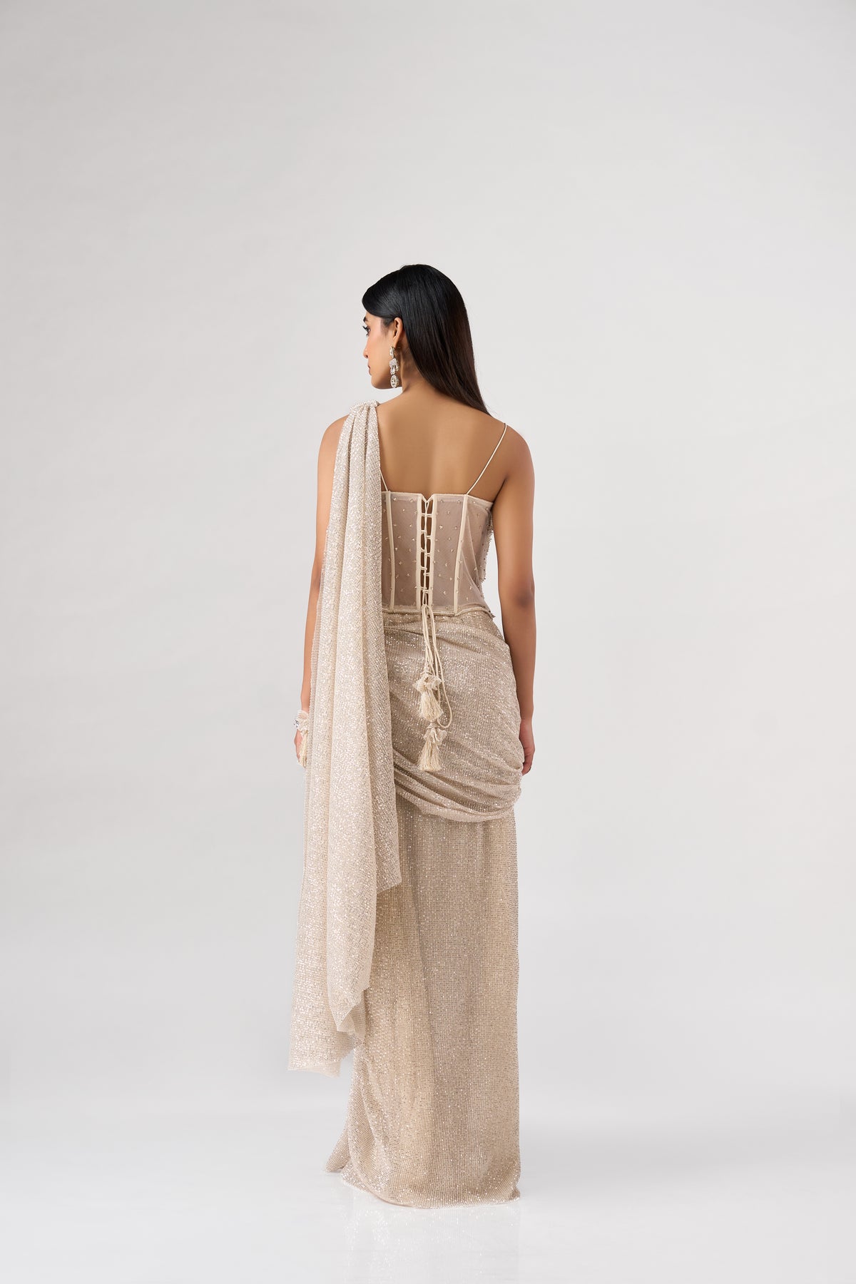 IVORY SEQUINS EMBELLISHED CORSET PRE DRAPED SAREE | Nishly Fashion House