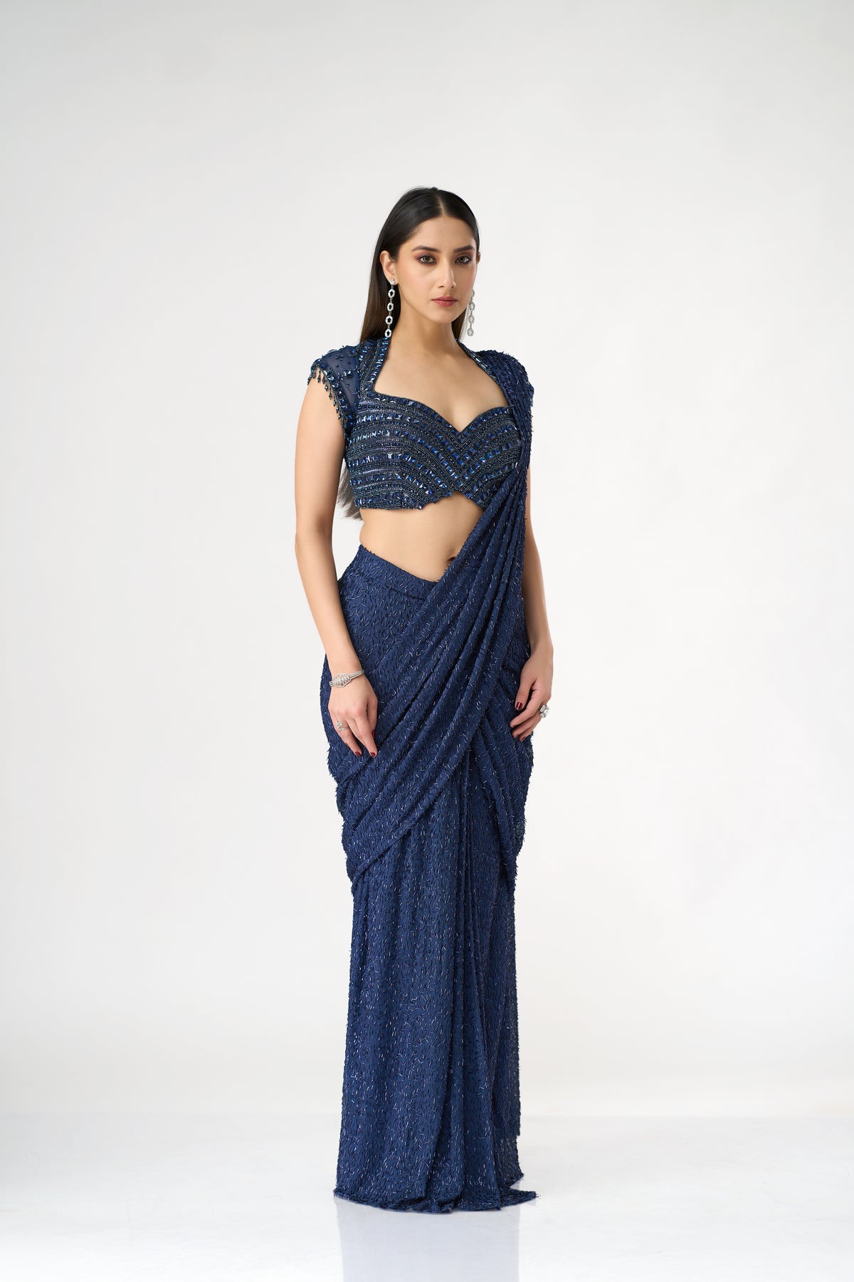 BLUE NET PRE DRAPED SAREE WITH CRYSTAL EMBELLISHED BLOUSE | Nishly Fashion House