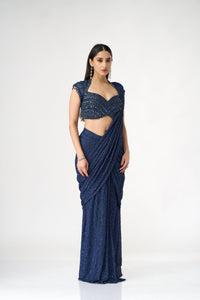 BLUE NET PRE DRAPED SAREE WITH CRYSTAL EMBELLISHED BLOUSE | Nishly Fashion House