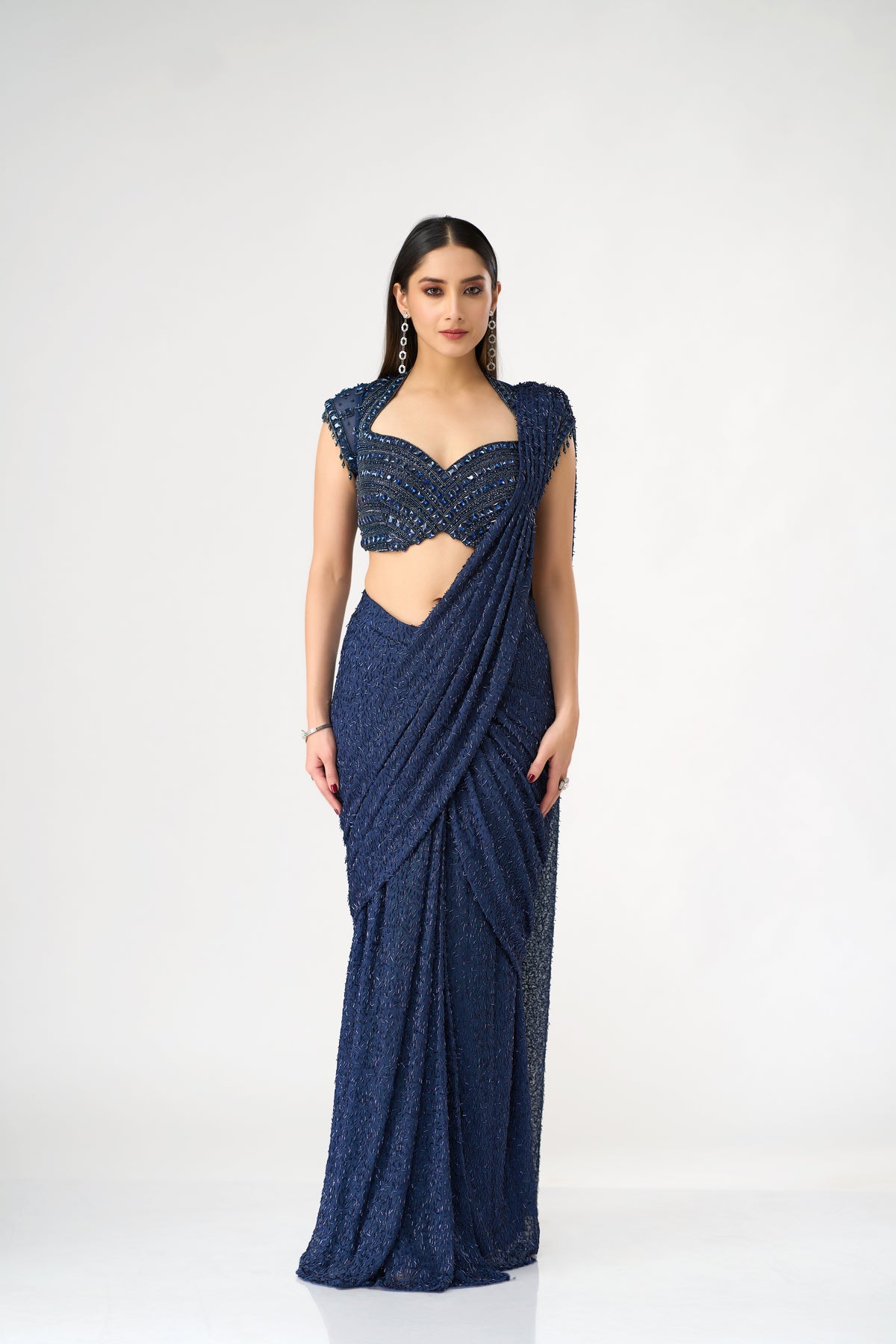 BLUE NET PRE DRAPED SAREE WITH CRYSTAL EMBELLISHED BLOUSE | Nishly Fashion House