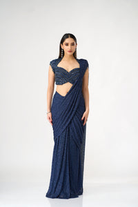 BLUE NET PRE DRAPED SAREE WITH CRYSTAL EMBELLISHED BLOUSE | Nishly Fashion House