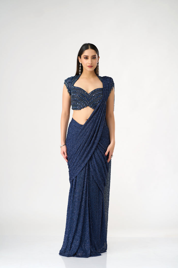 BLUE NET PRE DRAPED SAREE WITH CRYSTAL EMBELLISHED BLOUSE | Nishly Fashion House