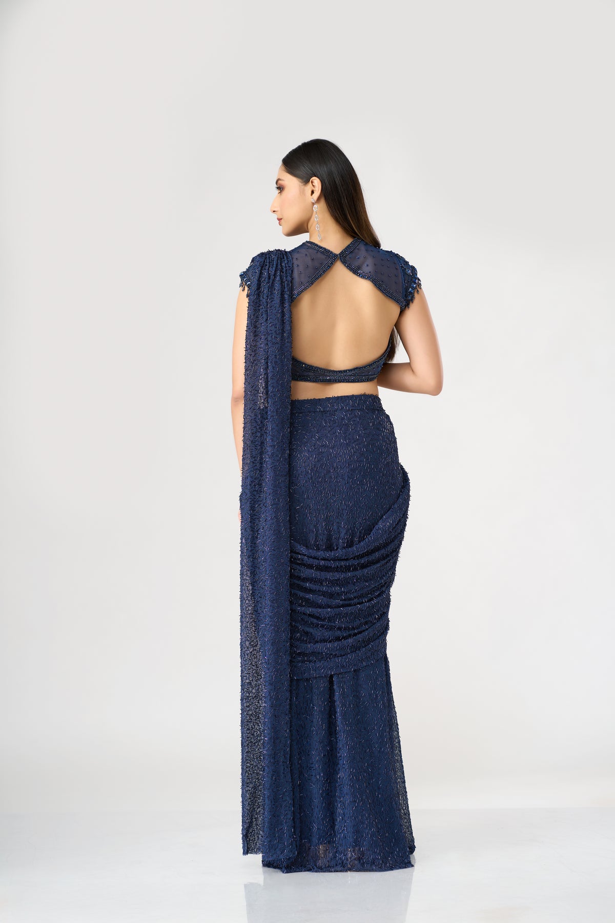 BLUE NET PRE DRAPED SAREE WITH CRYSTAL EMBELLISHED BLOUSE | Nishly Fashion House