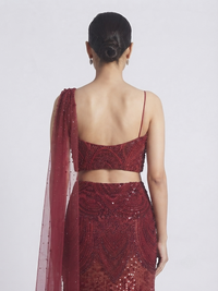 Maroon sequins fish cut lehenga choli with intricate bead and stone work