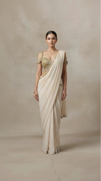 Off-white embroidered ready-to-wear wedding saree with Kundan work for wedding occasions