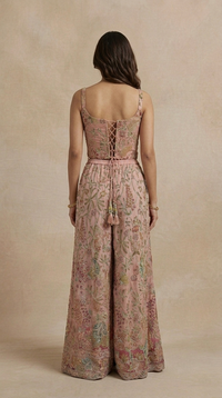 Pink printed sharara set with embellished corset blouse and choker dupatta