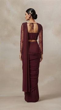 Wine shimmer lycra ready-to-wear saree with cutdana, gemstones and bead embroidery for glamorous party and wedding wear