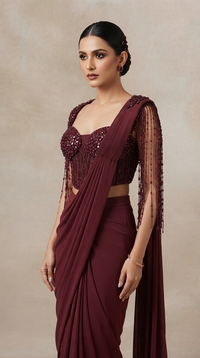 Wine embroidered corset saree with intricate crystal and beadwork for sangeet, engagement and wedding parties