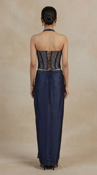 Stylish blue embroidered corset and pleated skirt set with intricate embellishments, elegant Indian ethnic wear for engagement and festive occasions.